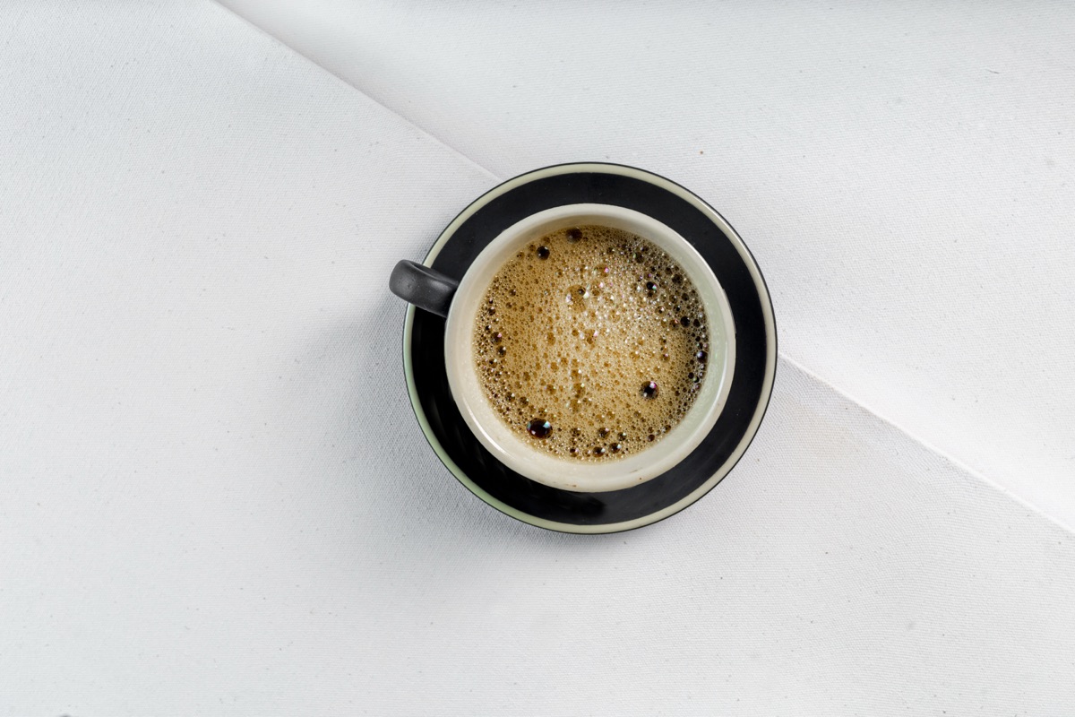 A shot of espresso with thick crema